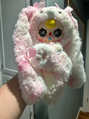 Baby three backpack with pacifier and crying eyes